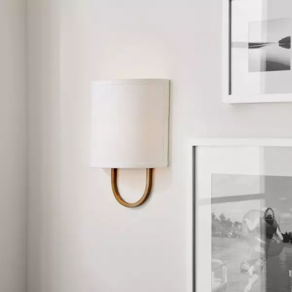 Elegancka lampa ścienna Nolvara z miękkim kloszem i metalowym ramieniem T082