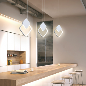 Białe kwadratowe, minimalistyczne lampy wiszące LED nad blatem kuchennym