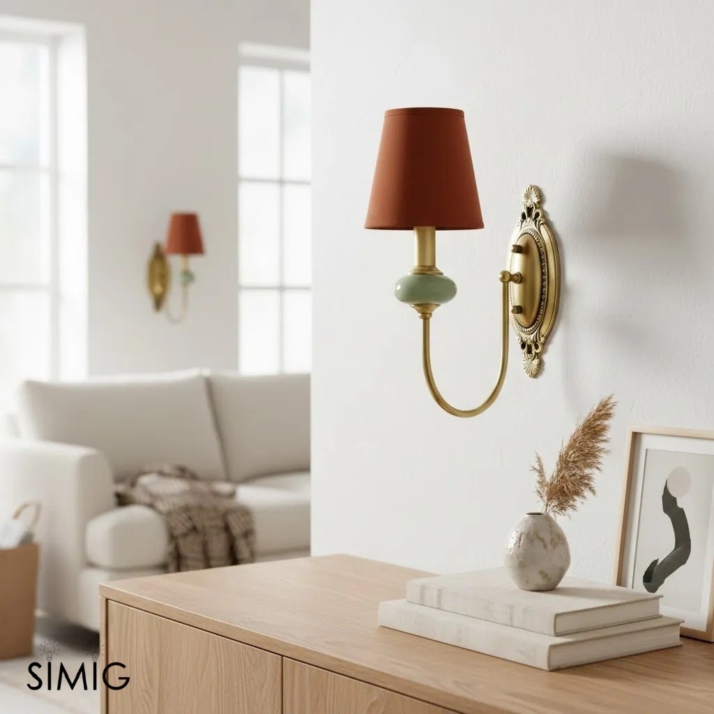 Red shade single wall sconce in a bright interior