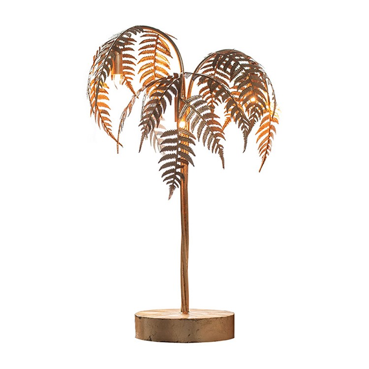 Tischleuchte in Form einer Palme auf weißem Hintergrund