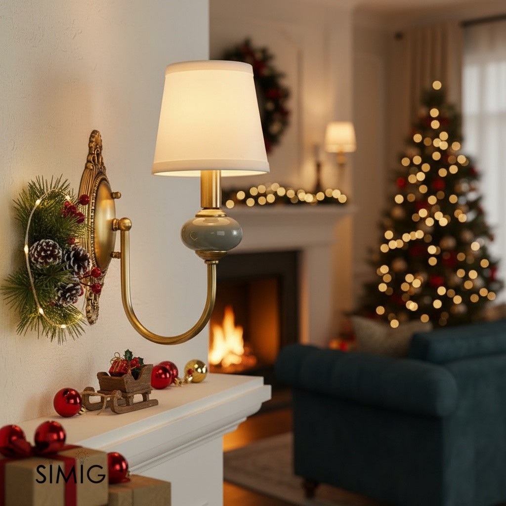 Single-arm Elaris wall sconce near fireplace and holiday tree