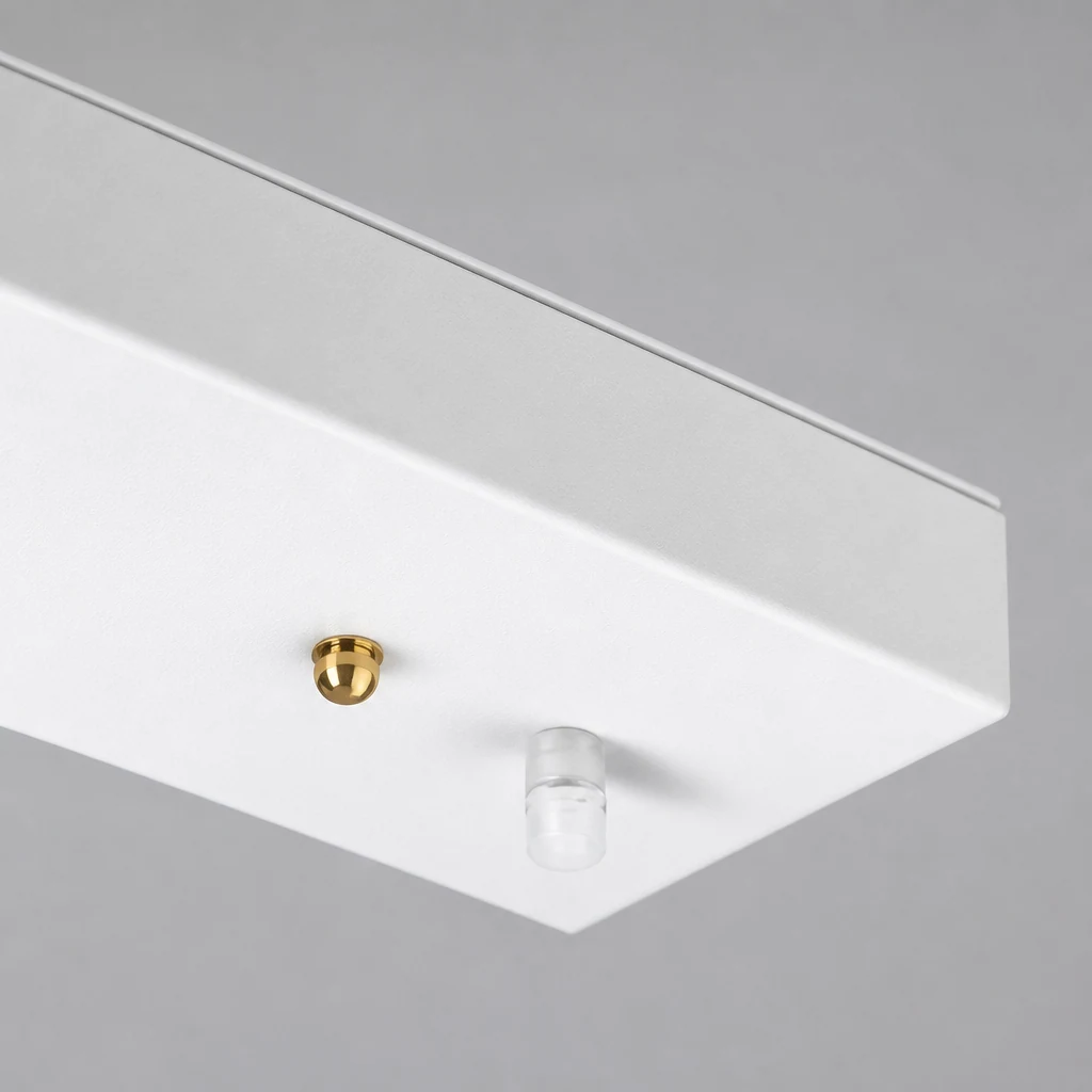 Close-up detail of the white rectangular ceiling panel finish