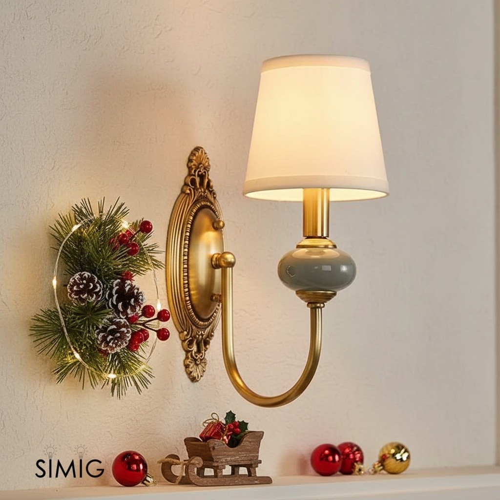 Elaris wall sconce in a styled tabletop scene