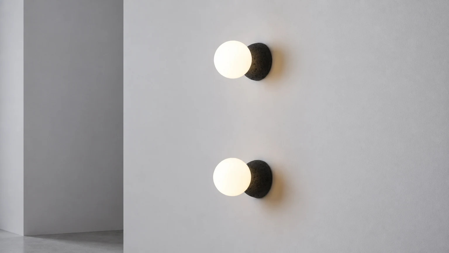Origo Volcanic Glass Sphere Wall Light in a warm wall setting