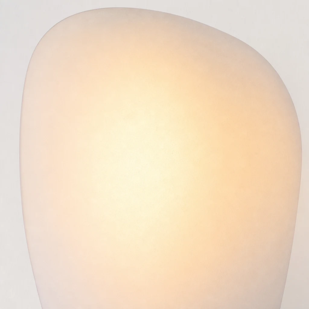 Zbliżenie materiału lampy ściennej Pebble Glass i szczegółów szkła