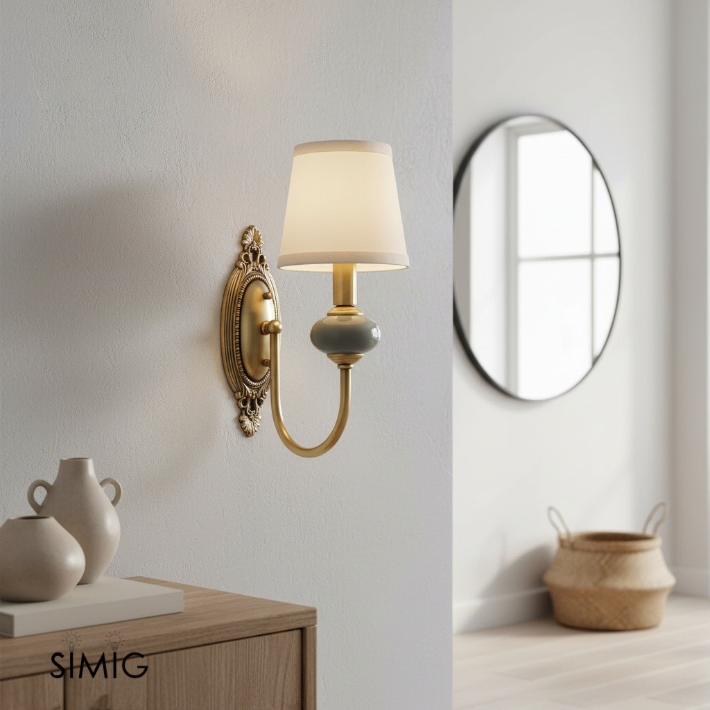 Elaris wall sconce installed near cabinet and mirror