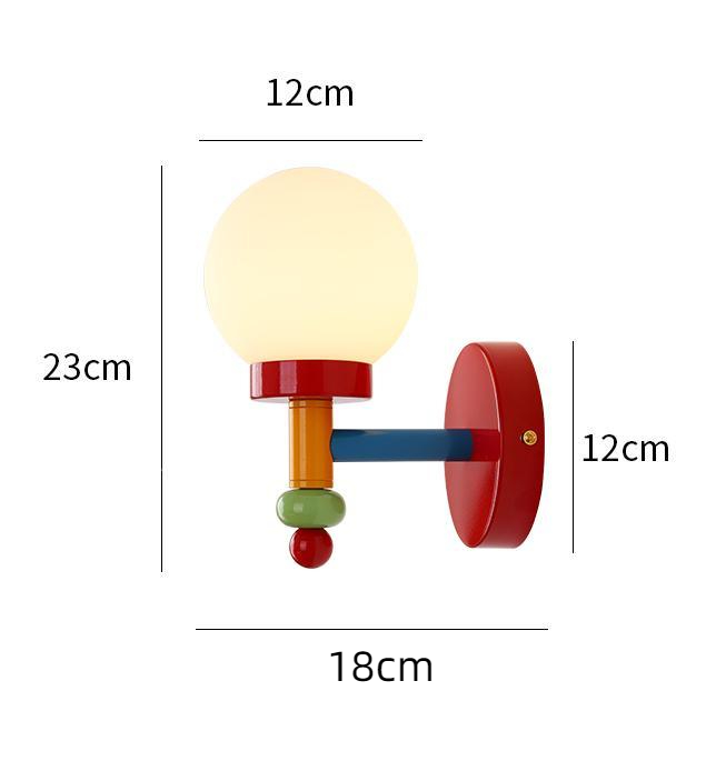 Lampa ścienna Art Decor Macaron S50 schemat wymiarowy przedstawiający średnicę 12 cm i wysokość 23 cm