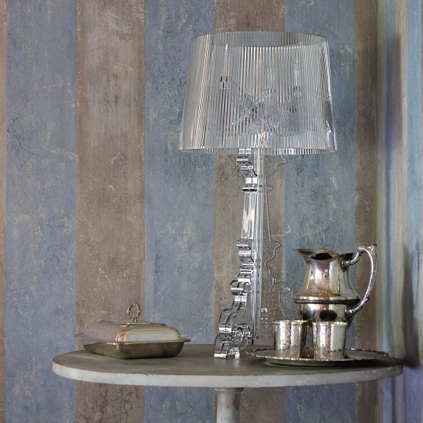 Clear Bourgie lamp on a styled small table