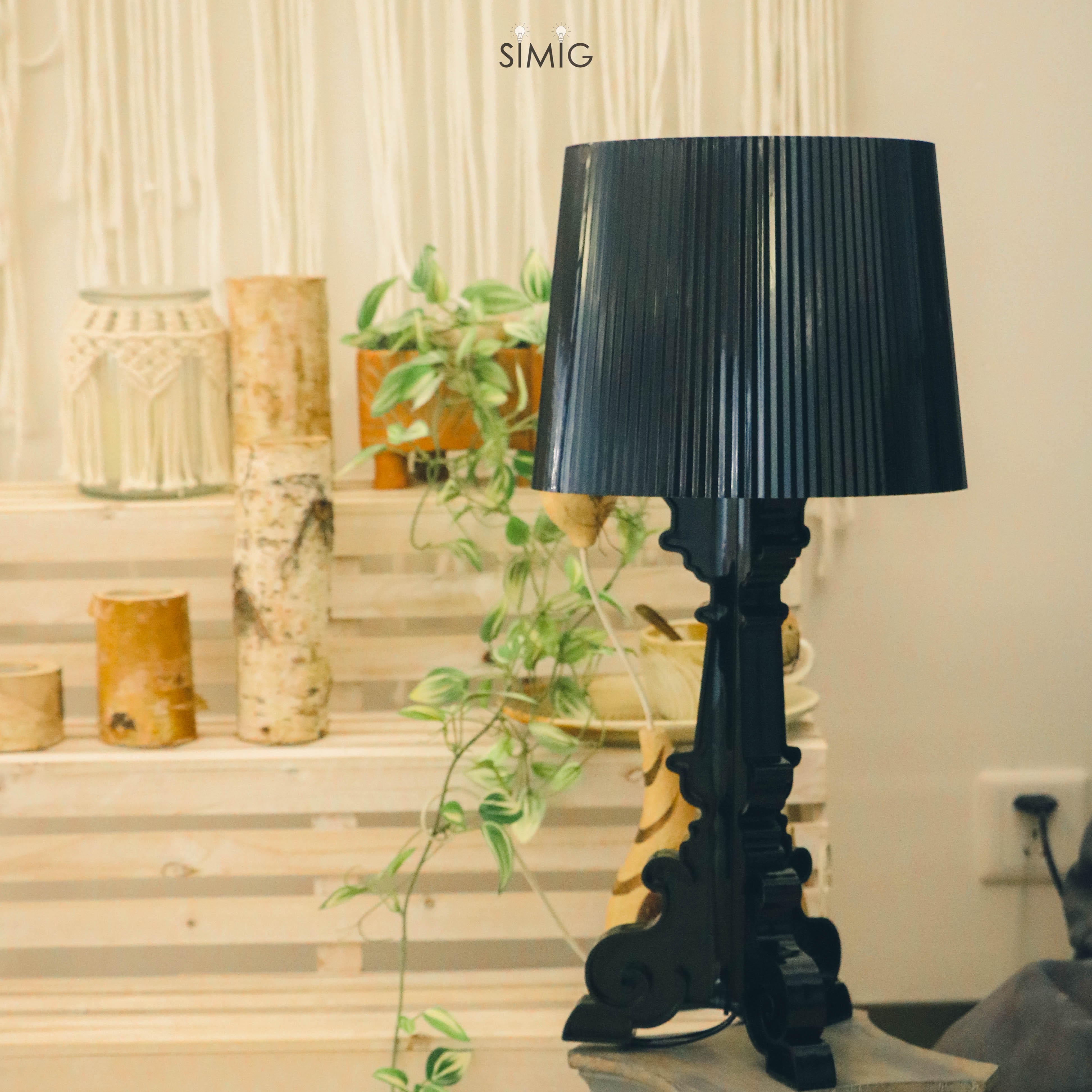 Black Bourgie lamp with plants in interior decor
