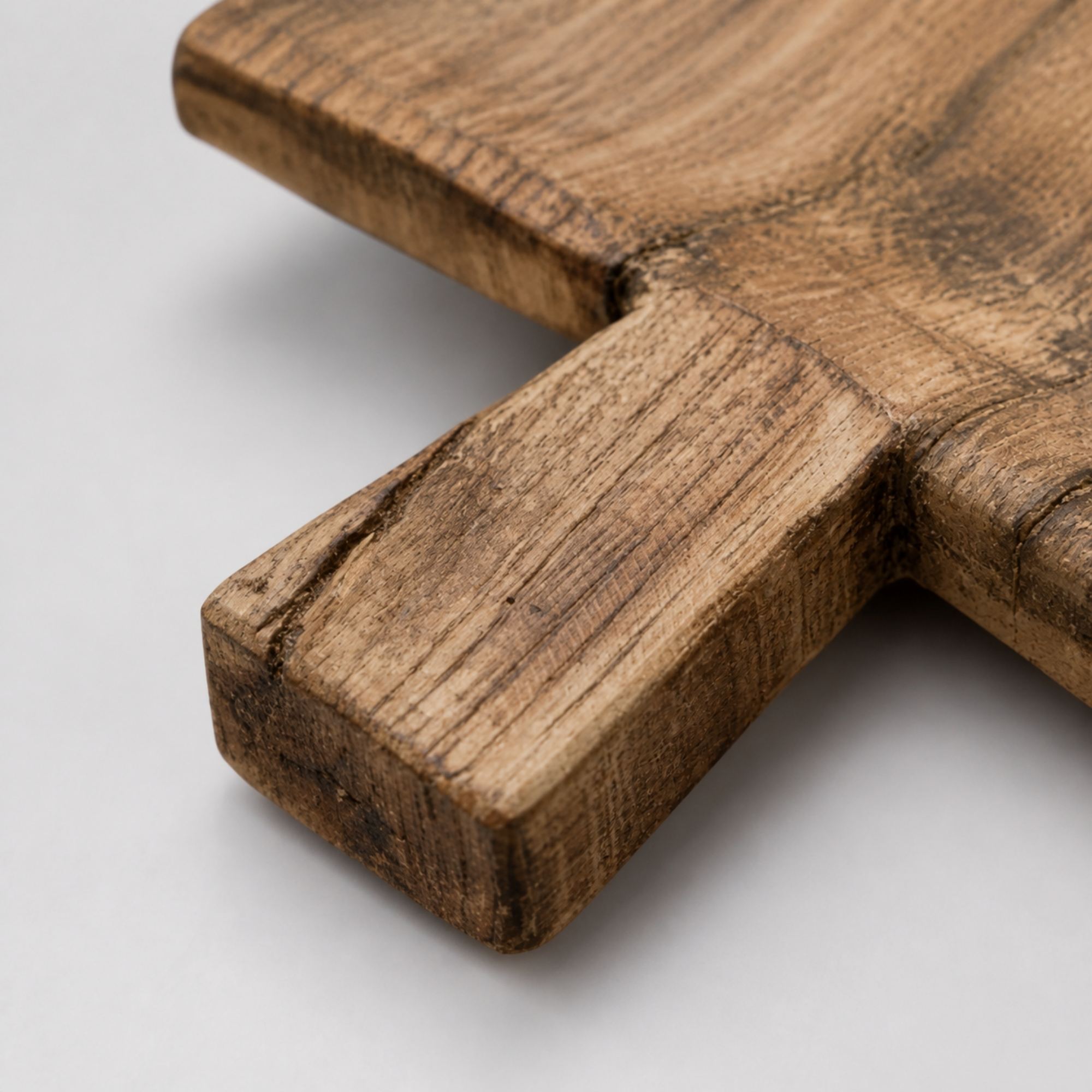 Close detail of rustic wood grain and side handle