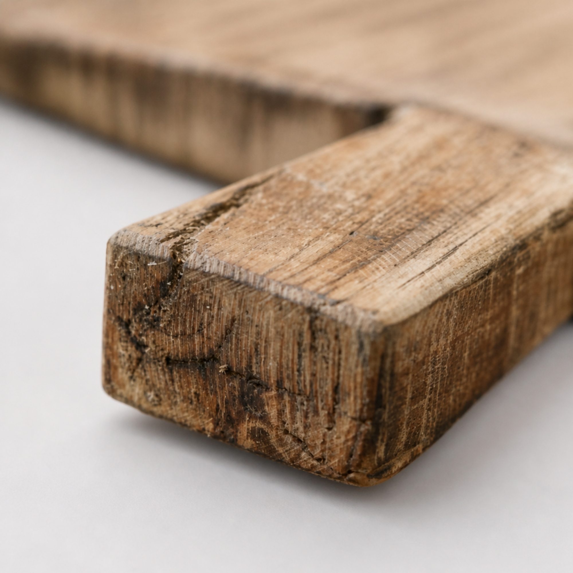 Close detail of distressed wooden serving tray handle