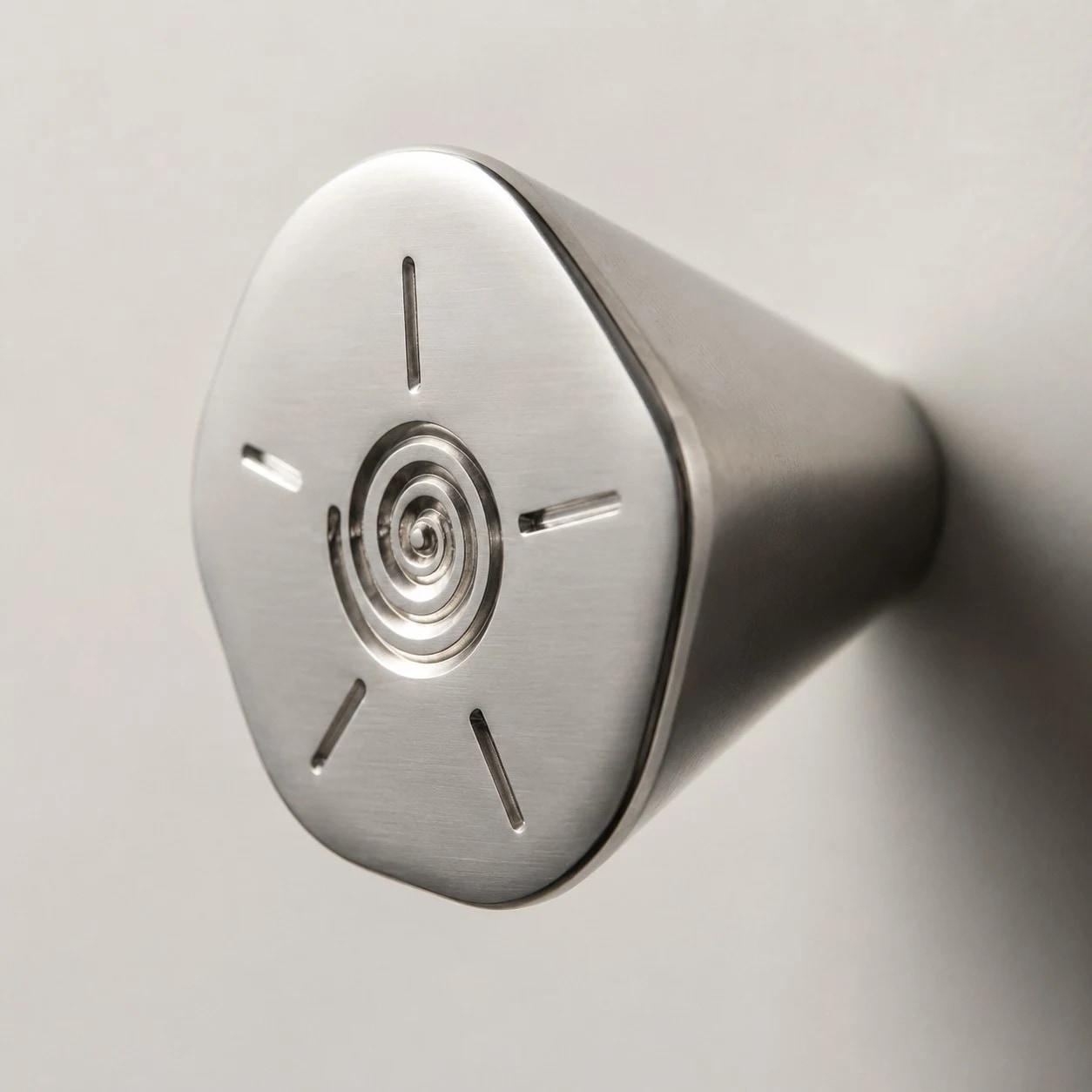 Tapered side profile of titanium silver cabinet knob