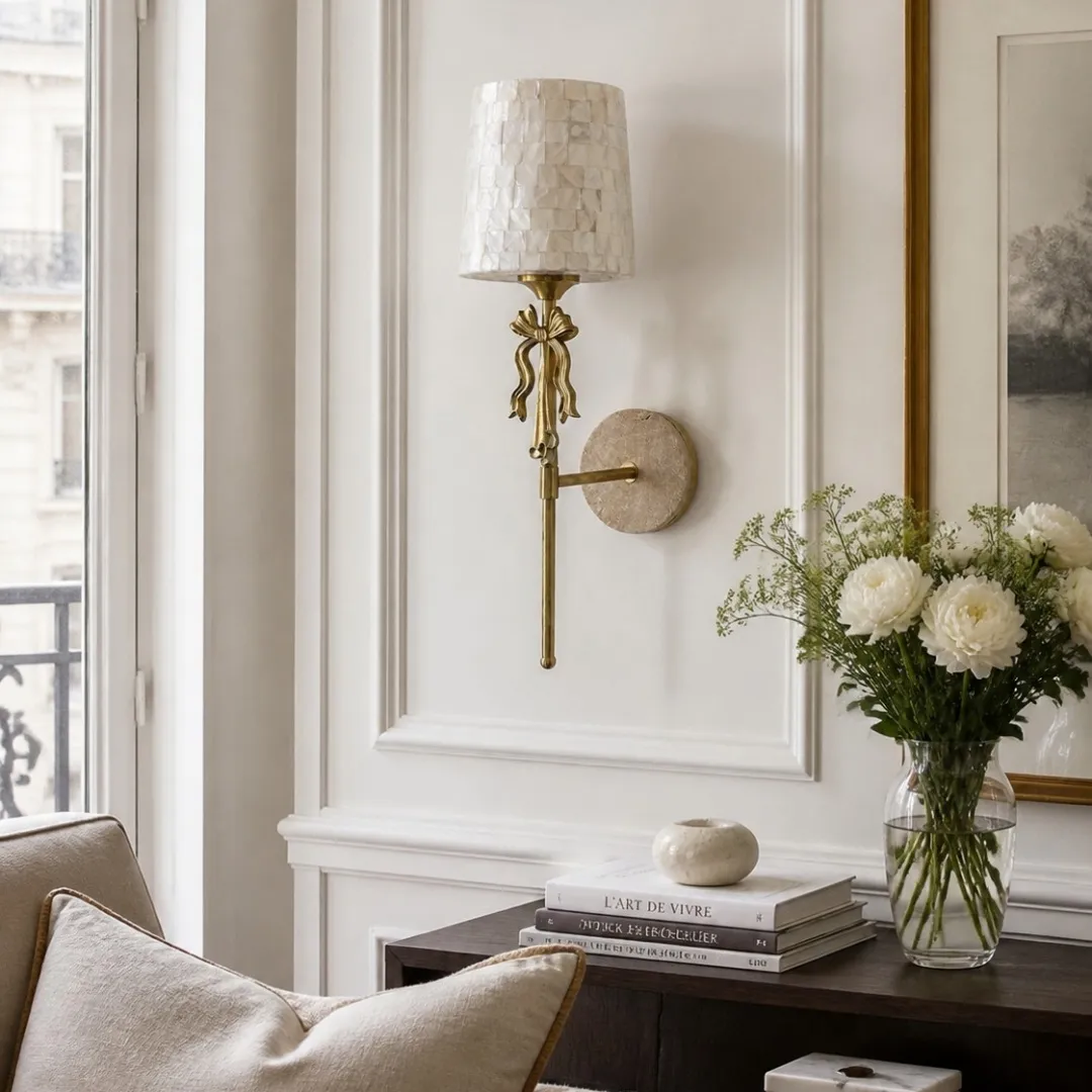 Capiz shell bow wall sconce installed in an elegant living room