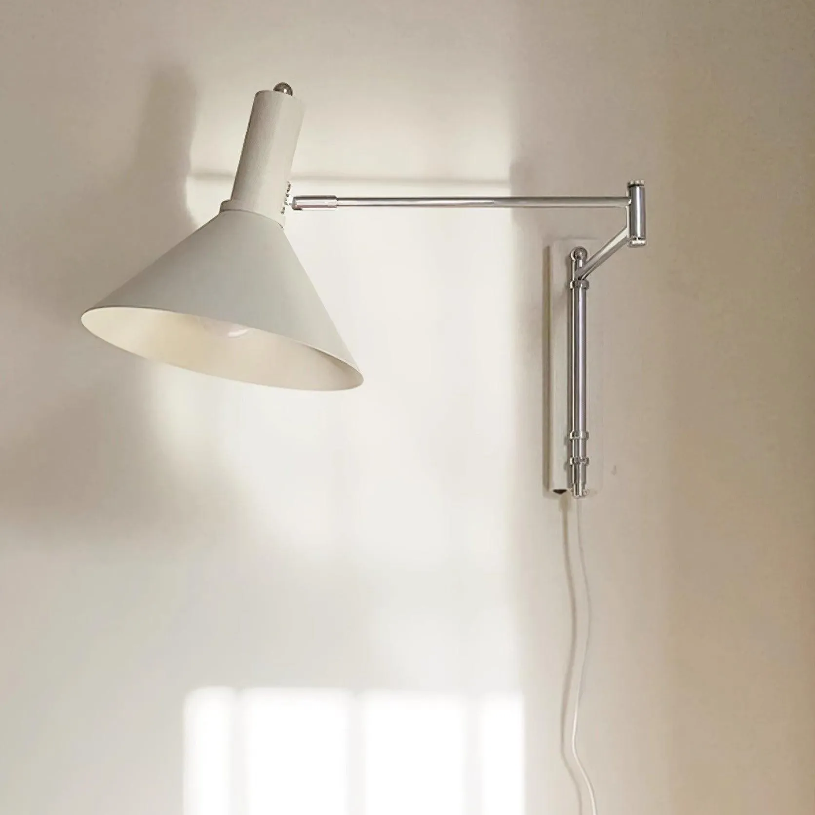 Adjustable Swing Arm Peak Plug In Wall Lamp S189